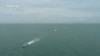 Dalam gambar yang diambil dari rekaman video yang ditayangkan Sabtu, 8 April 2023 tampak sebuah kapal militer China berlayar di Selat Taiwan.