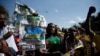 Supporters of the ruling ZANU-PF party of President Emmerson Mnangagwa celebrate following general elections in Harare, Zimbabwe, July 31, 2018. 
