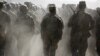 FILE - Afghan National Army (ANA) officers march during a training exercise at the Kabul Military Training Centre in Afghanistan, Oct. 7, 2015.