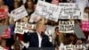 President Donald Trump pumps his fist to supporters at the conclusion of a campaign rally, Feb. 18, 2017, in Melbourne, Fla. 