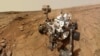 NASA's Mars rover Curiosity is pictured in this February 3, 2013 handout self-portrait obtained by Reuters February 9, 2013. The image was made by combining dozens of exposures taken by the rover's Mars Hand Lens Imager (MAHLI). The rover is positioned at