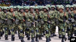 FILE - Nigerian soldiers march during 58th anniversary celebrations of Nigerian independence, in Abuja, Nigeria, Oct. 1, 2018. 