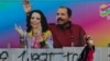 Affiche du président nicaraguayen Daniel Ortega avec la vice-présidente, son épouse Rosario Murillo, Managua, 27 mars 2020. (Reuters/Oswaldo Rivas)