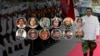 Background: Cambodia's Prime Minister Hun Sen walks past an honor guard upon his arrival to attend the first parliamentarian meeting to form a new government after the national elections in July at the National Assembly building in Phnom Penh, Cambodia, September 24, 2008. (REUTERS/Chor Sokunthea) Foreground: Top row, from left to right: Gen. Kun Kim, RCAF Deputy Supreme Commander; Gen. Mok Chito, Deputy Supreme Commissioner of National Police; Gen. Neth Savoeun, Supreme Commissioner of National Police; Gen. Pol Saroeun, RCAF Supreme Commander. Gen. Sao Sokha, Commander of National Gendarmerie; General Sok Phal, Supreme Director of the Supreme Directorate for Immigration. Bottom row, from left to right: Lt. Gen. Bun Seng, Deputy Army Commander, Commander of Military Region 5; Lt. Gen. Chap Pheakdey, Deputy Army Commander, Brigade 911 Commander; Lt. Gen. Choeun Sovantha, Deputy Army Commander, Commander of Military Region 2; Lt. Gen. Rat Sreang, National Gendarmerie Deputy Commander.