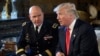 President Donald Trump, right, speaks as Army Lt. Gen. H.R. McMaster, left, listens at Trump's Mar-a-Lago estate in Palm Beach, Fla., Feb. 20, 2017, where Trump announced that McMaster will be the new national security adviser.
