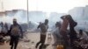Des manifestants dispersés à coup de gaz lacrymogène à Nouakchott, Mauritanie, 26 mai 2012. 