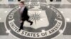 FILE - A man walks through the lobby of CIA headquarters in Langley, Virginia, Aug. 14, 2008. On Wednesday, the agency posted online instructions in Korean, Mandarin and Farsi detailing steps potential informants could safely take to contact U.S. intelligence officials.
