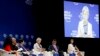 South Korean Foreign Minister Kang Kyung-Wha, center, gestures during a discussion on Asia's Geopolitical Outlook in the ongoing World Economic Forum on ASEAN at the National Convention Center Thursday, Sept. 13, 2018, in Hanoi, Vietnam. Listening from left are, moderator Julie Yoo, Sri Lankan Prime Minister Ranil Wickremesinghe, Vietnamese Deputy Prime Minister, and Foreign Minister Pham Binh Minh, Kang, Japanese Foreign Minister Taro Kono, and Lynn Kuok of the Institute of International Strategic Studies, Singapore. The World Economic Forum has attracted hundreds of participants with the theme: ASEAN 4.0: Entrepreneurship and the Fourth Industrial Revolution. (AP Photo/Bullit Marquez)